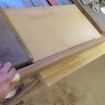 Lisser avec du papier de verre