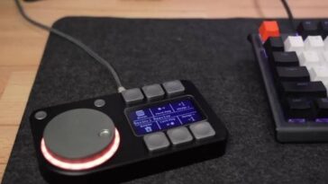 DIY Macro pad with six buttons, an OLED display, and a rotary knob with RGB lighting