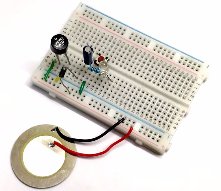 Circuit de production d'énergie au pied utilisant un capteur piézoélectrique 1 Electricity Generation using Piezoelectric Sensor